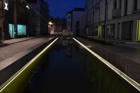 Street with water and LED in concrete in Bruul area, Mechelen