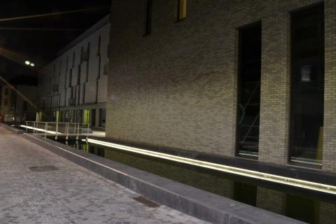 Street with water and LED in concrete in Bruul area, Mechelen